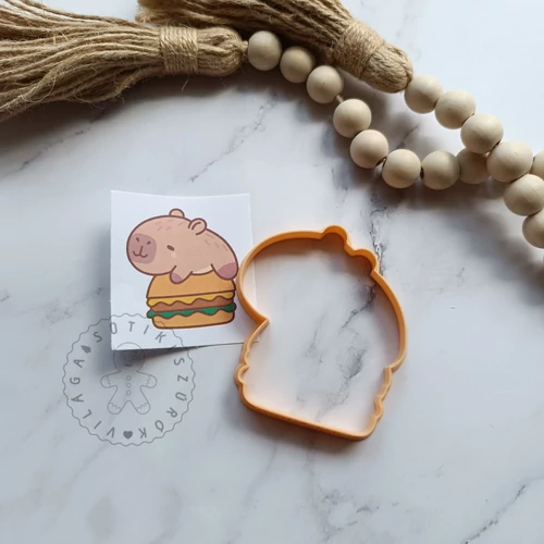 Capybara hamburgerrel körvonal sütikiszúró
